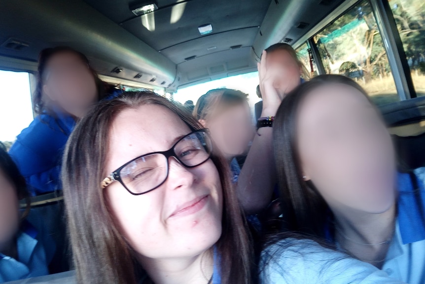 Nadia Bach on bus with friends.