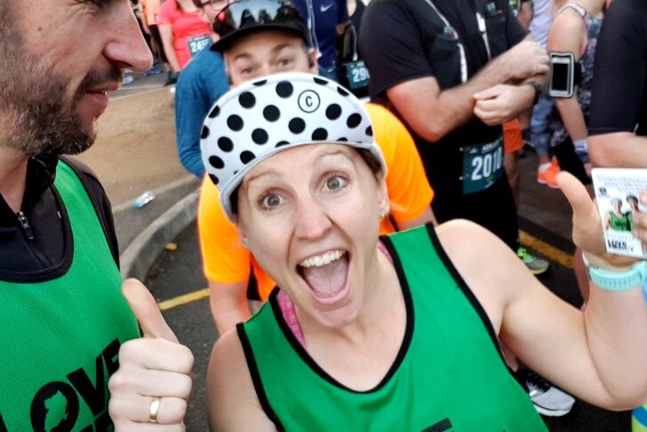Kate McDonald gives a big thumbs up at the starting line of the Adelaide Marathon 2019.
