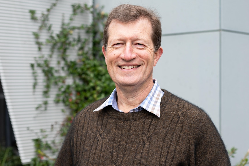 Profile shot of David Durrheim smiling at the camera