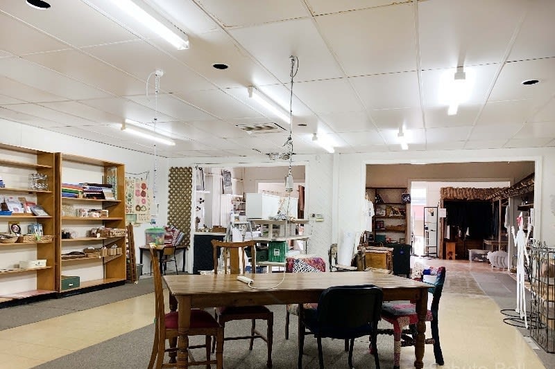 Interior of empty office for sale, with material craft in bookshelves