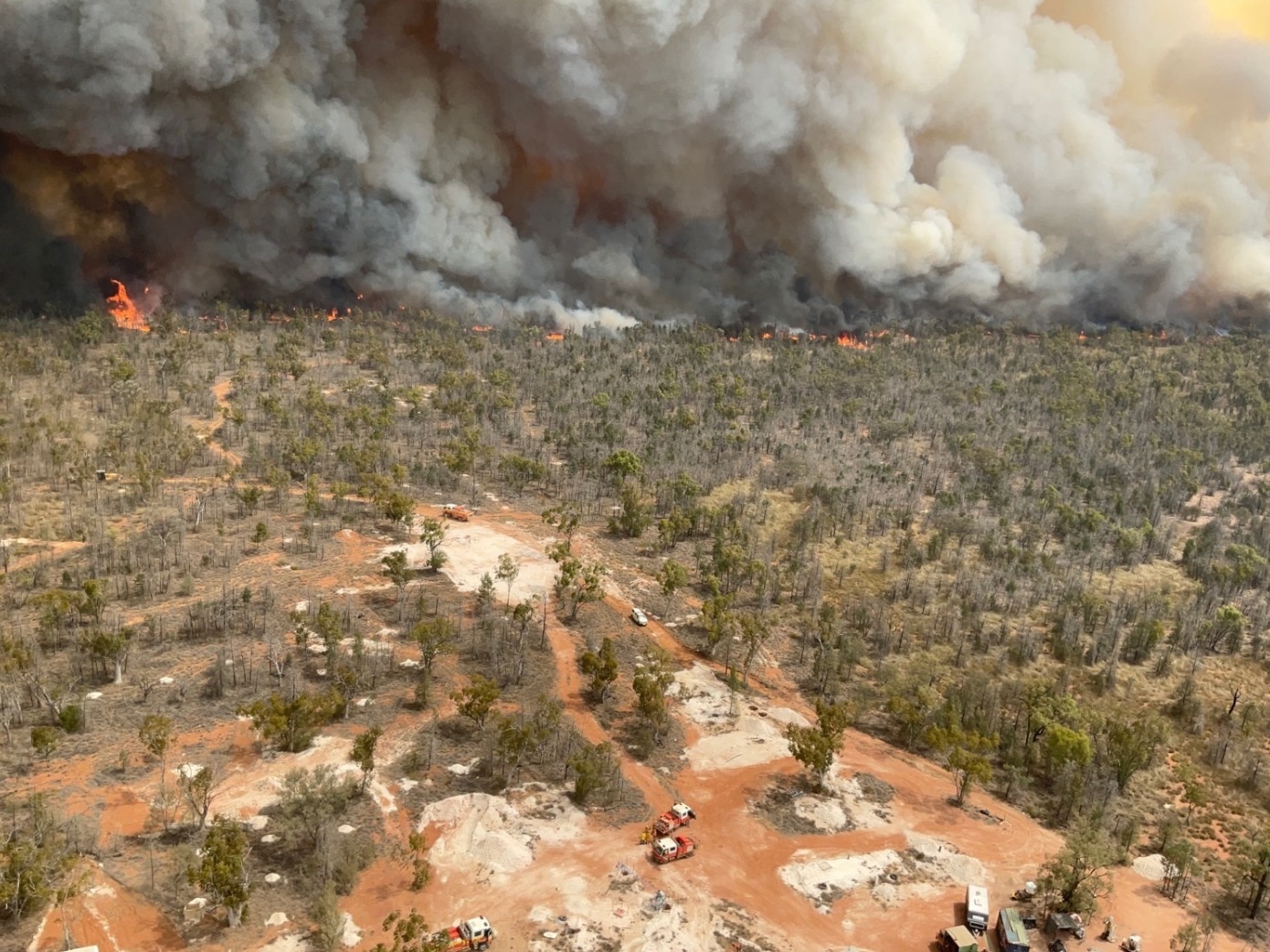 Firefighting crews battle a large foiefront in bushland near Lightning Ridge. 