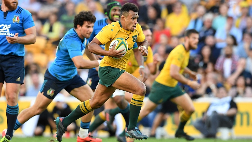 Will Genia of the Australian Wallabies gains ground against Italy at Lang Park in June 2017.
