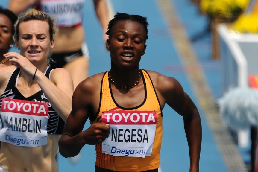 A close up of runner Negesa Annet mid-race