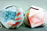 An image of two face masks with the US and Chinese flags on them