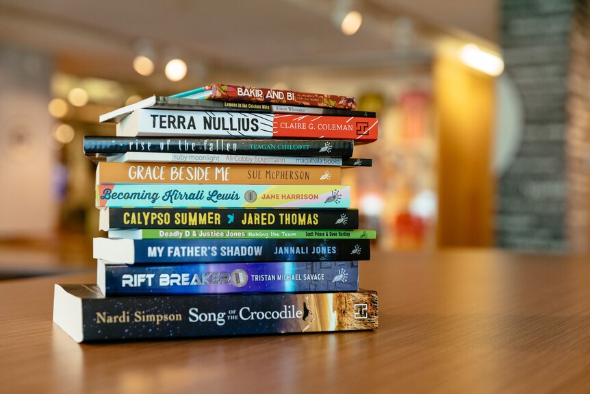 A stack of books on a table