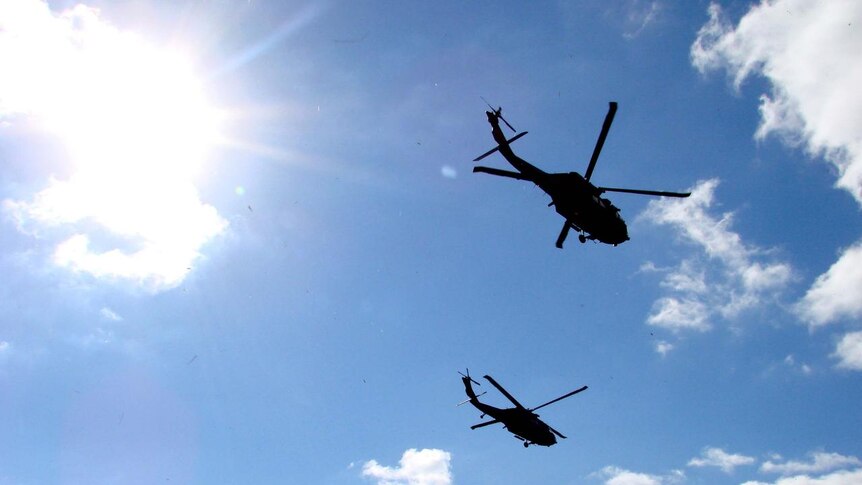 Two Australian Army Black Hawk helicopters