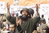 Anti-Gaddafi protesters shout slogans