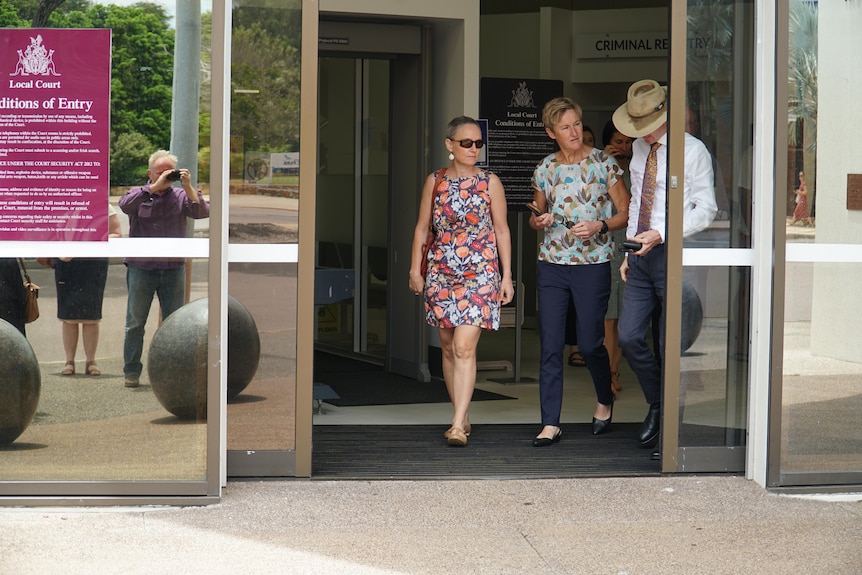 three people leave court in darwin