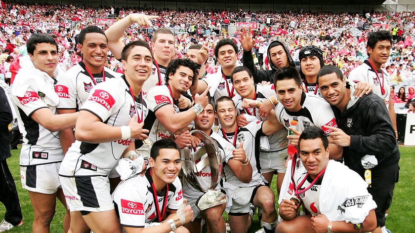 Trans-Tasman terrors ... the young Warriors pose with their premiership trophy.