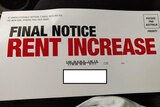 An envelope that reads "final notice, rent increase" in huge red lettering