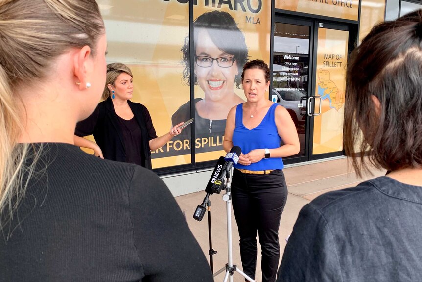 Leader of the opposition Lia Finocchiaro stands at the front of her electorate office at a press conference.