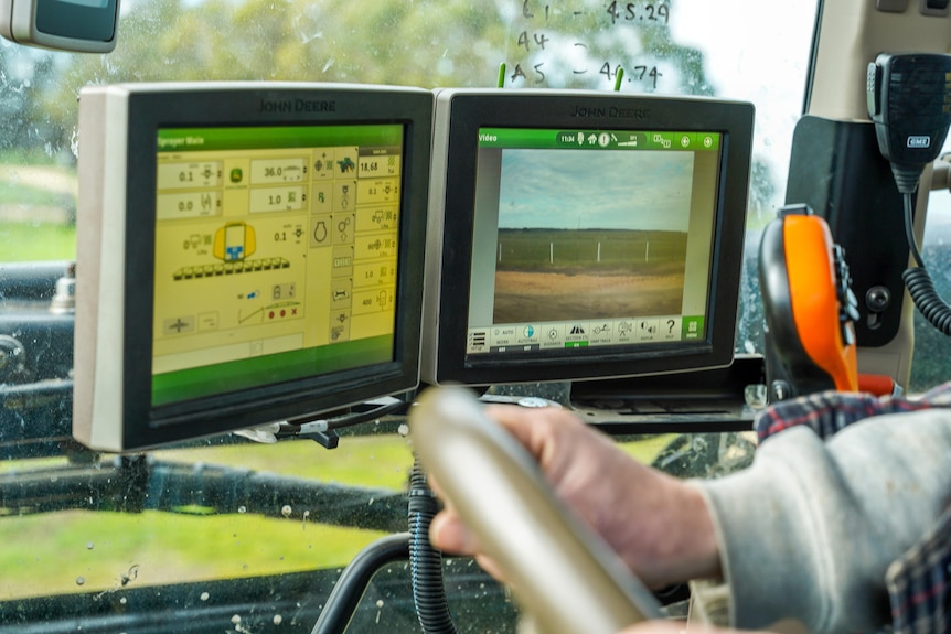 Tractor computer screens displaying hi-tech farming 