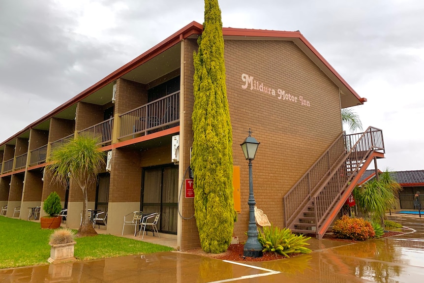 The exterior of a two-storey brick building with Mildura Motor Inn written on it.