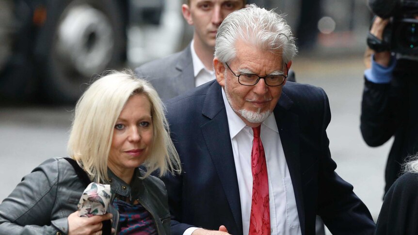Rolf Harris and his daughter Bindi arrive at Southwark Crown Court.