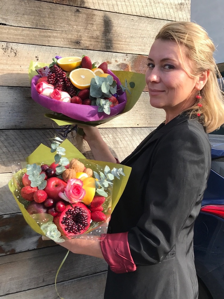 Vlada Kazimirchuk with two of her edible arrangements