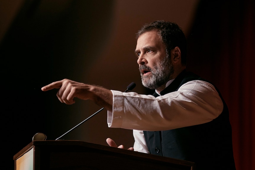 Rahul Gandhi lectures at a podium in New York, 2023.