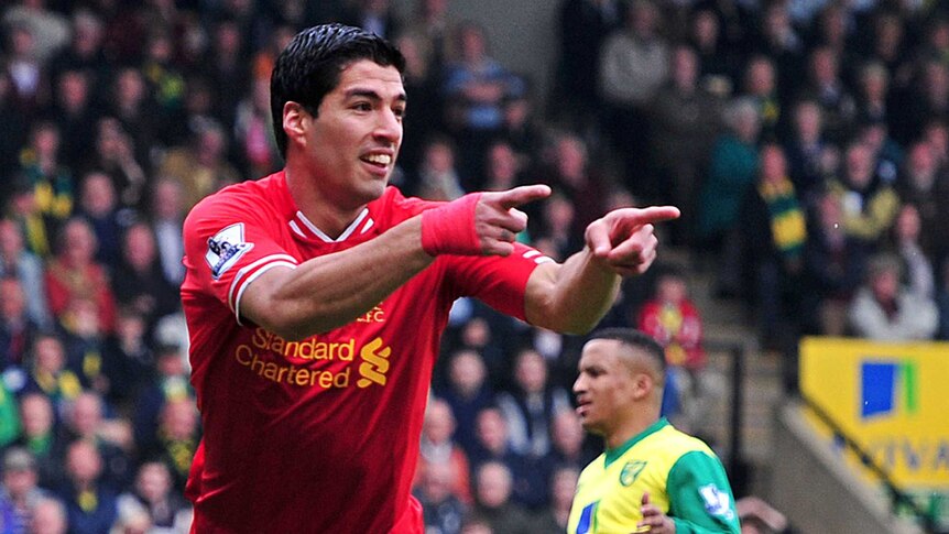 Luis Suarez celebrates a goal for Liverpool