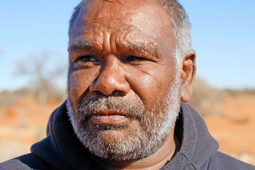 A portrait shot of a man.