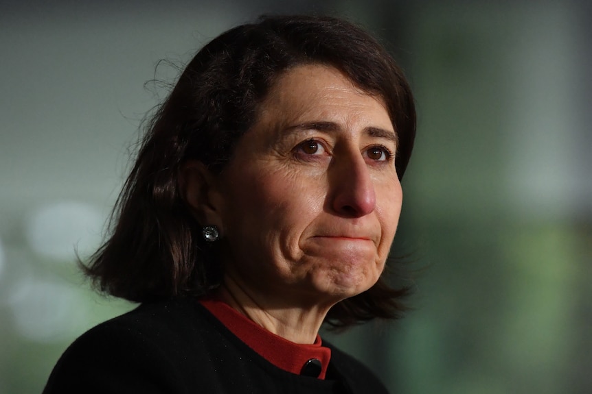 Gladys Berejiklian purses her lips.