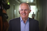 Malcolm Turnbull smiles in the halls of Parliament House on Friday, February 5, 2016.