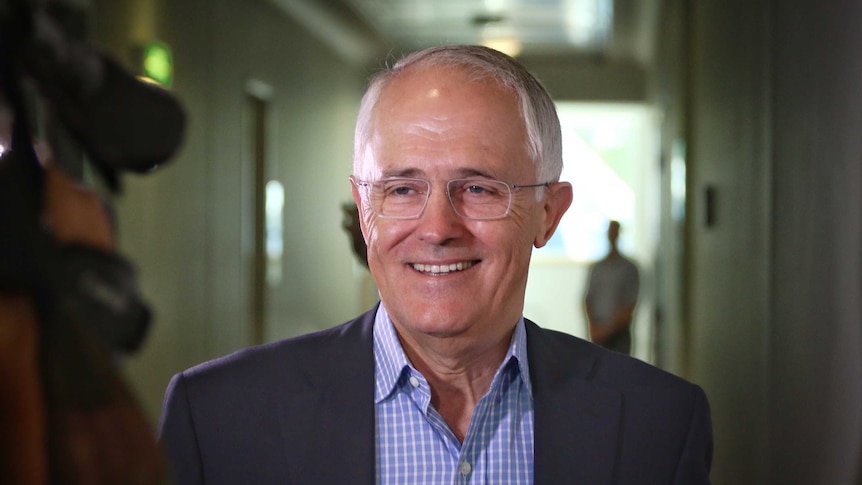 Malcolm Turnbull smiles in the halls of Parliament House on Friday, February 5, 2016.