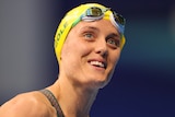 Australian swimmer Ellie Cole smiles as she gets out of the pool at the Tokyo Paralympics.