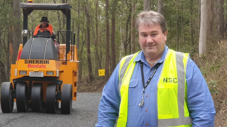 Nambucca Shire Assistant General Manager, Engineering Services, Paul Gallagher oversees the laying of an Otta seal road.