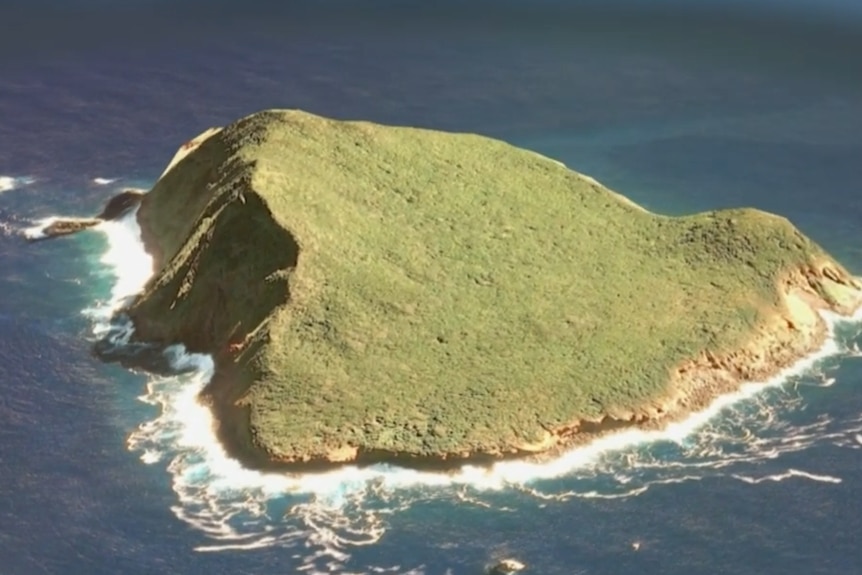 A photo showing the Eua Islam in Tonga, which is green and surrounded by ocean.