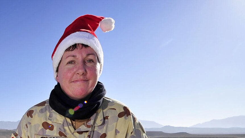 Festive season: Corporal Faith Snudden sends a Christmas message home from Tarin Kot in Afghanistan.