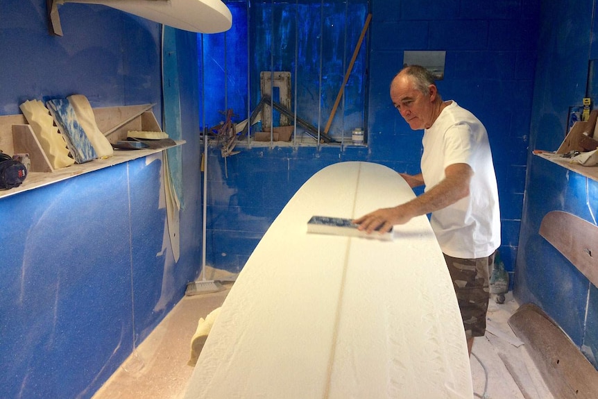 Gold Coast surfboard shaper Alan Colk working on one of his boards