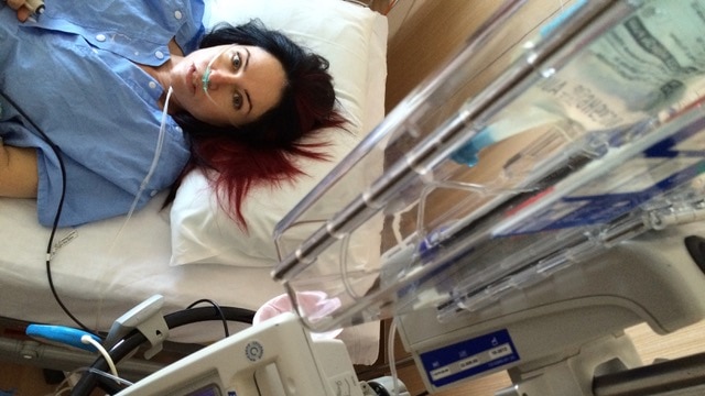 Emma Jane lays in hospital in 2014.