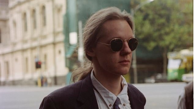 The 23-year-old Julian Assange on his way to court in Melbourne in 1995, where he pleaded guilty to 24 counts of hacking