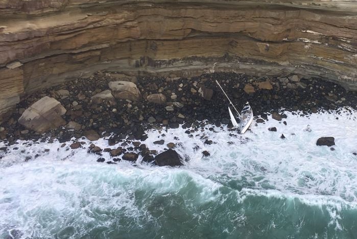 Claire de Lune at the base of cliffs at Cape Raoul.