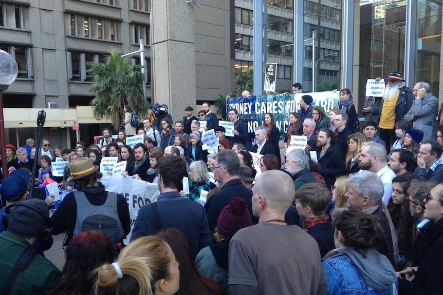 Supporters of Jonathan Moylan stage a silent vigil outside the Supreme Court in Sydney