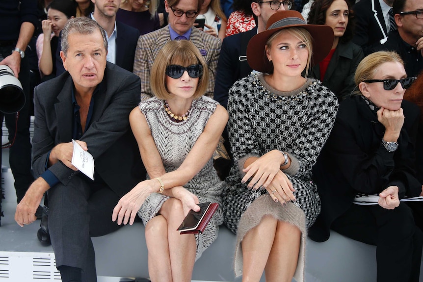 Mario Testino, Anna Wintour and Maria Sharapova at a Chanel fashion show.