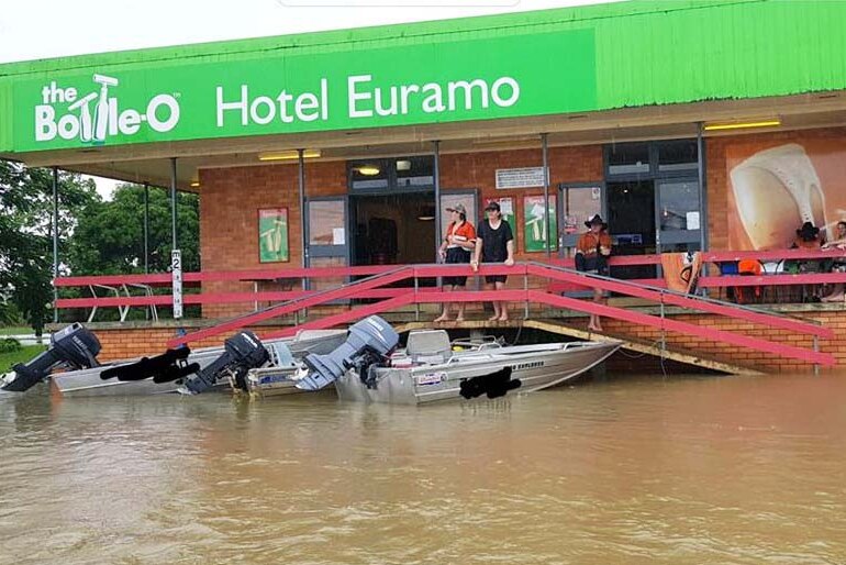 Tinnies moored outside the flooded Hotel Euramo in far north Queensland on March 9, 2018,
