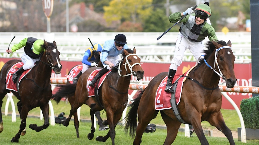 Brett Prebble celebrates on board Incentivise in the Caulfield Cup