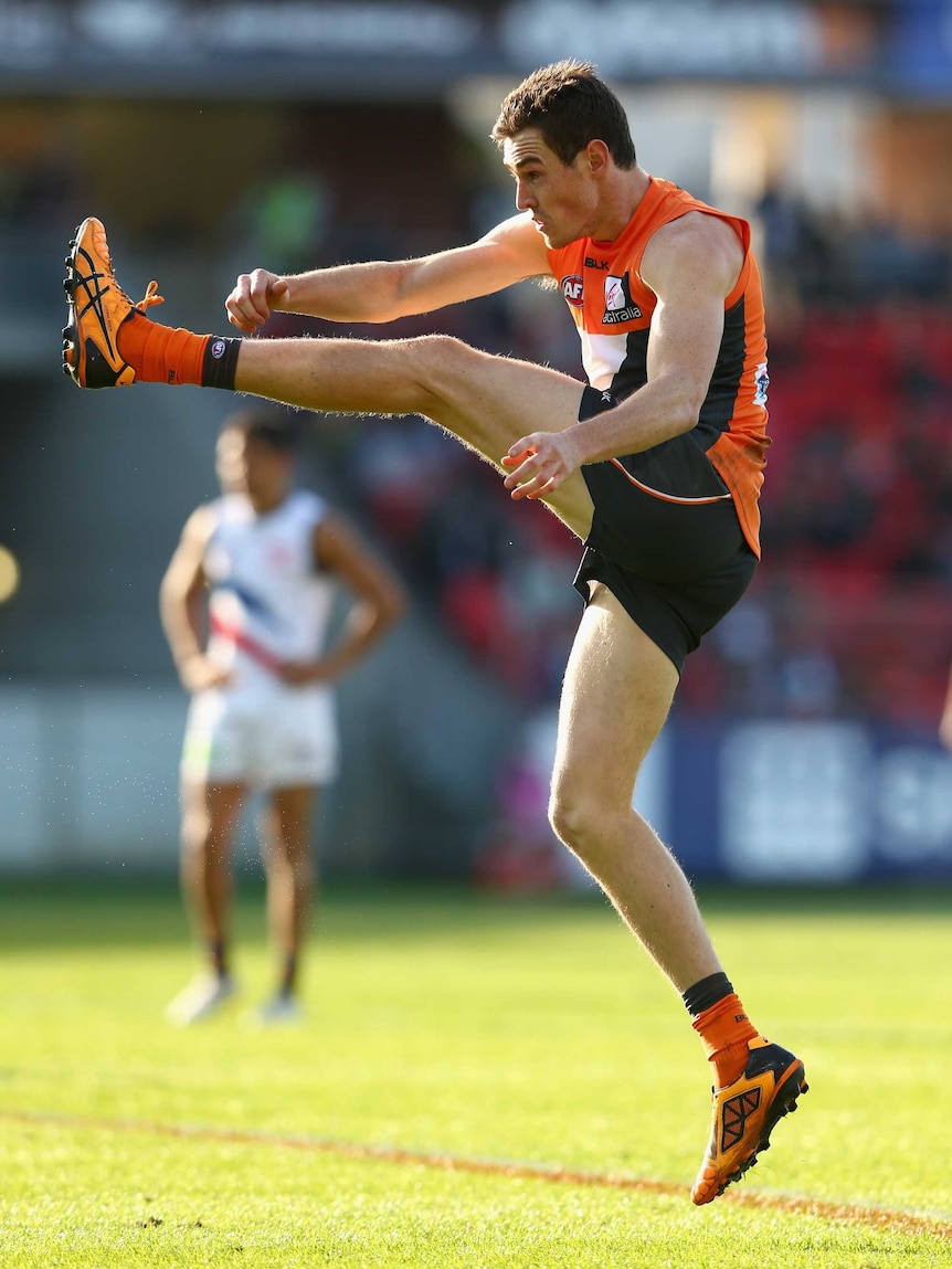 Sharp shooter ... Giants forward Jeremy Cameron kicks for goal against the Crows