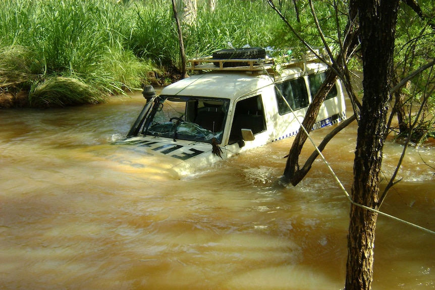 Police 4WD washed away near Warmun