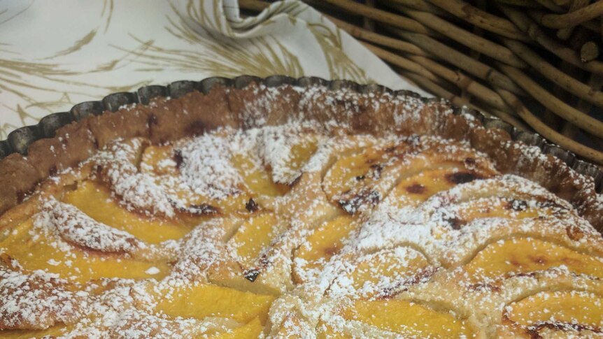 Peach Tart dusted with icing sugar