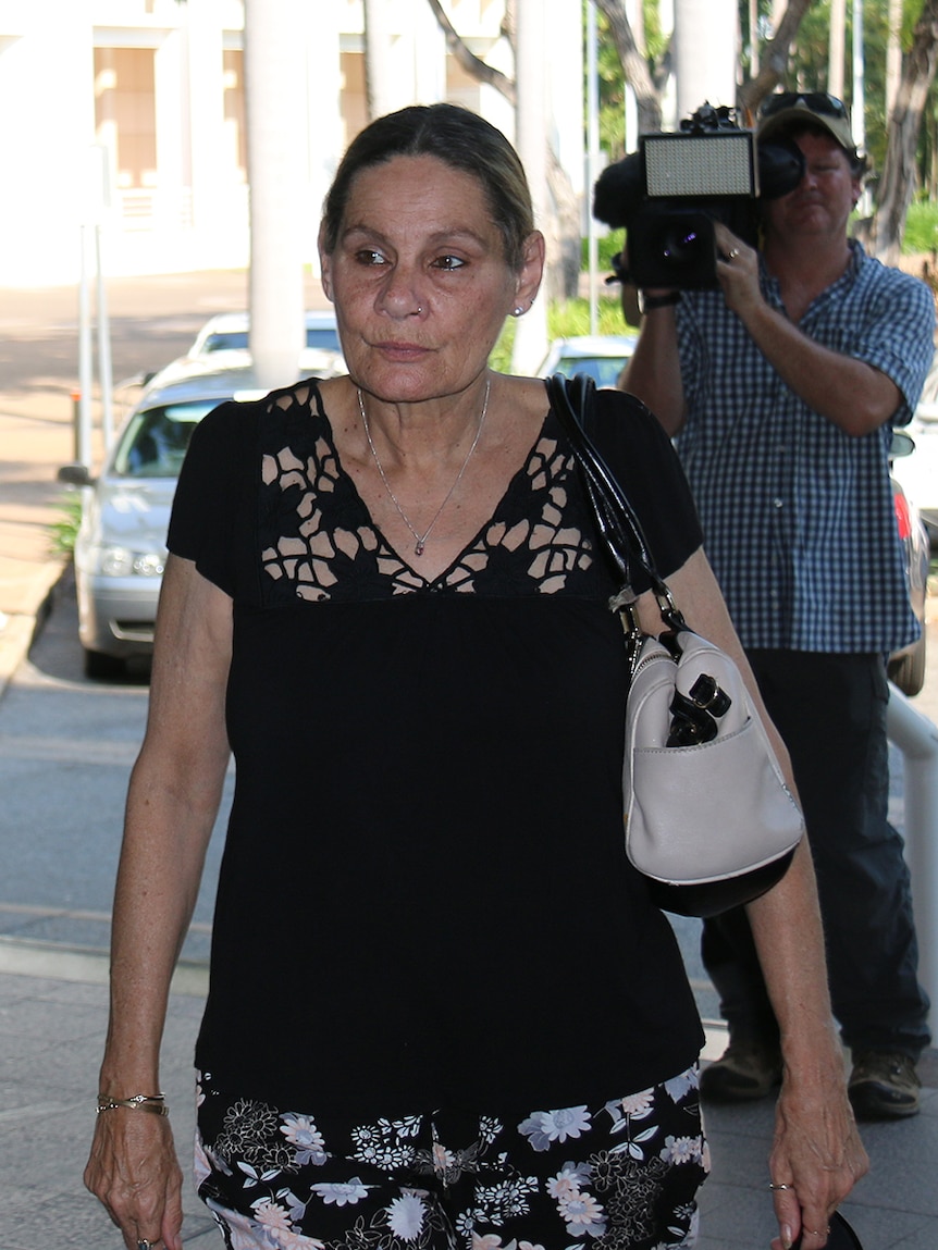 Sandra Kitching walks into Darwin's Supreme Court to give evidence at the Royal Commission