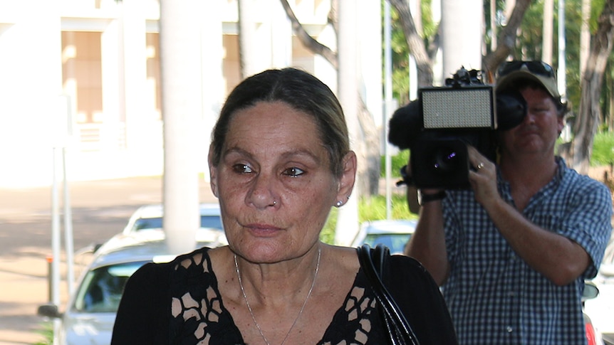 Sandra Kitching walks into Darwin's Supreme Court to give evidence at the Royal Commission