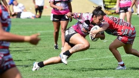 Redfern All Blacks women's rugby league player on the field