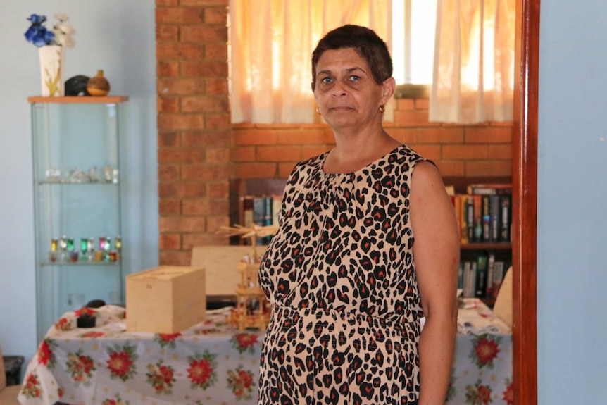 Leanne Muir stands in her dining room