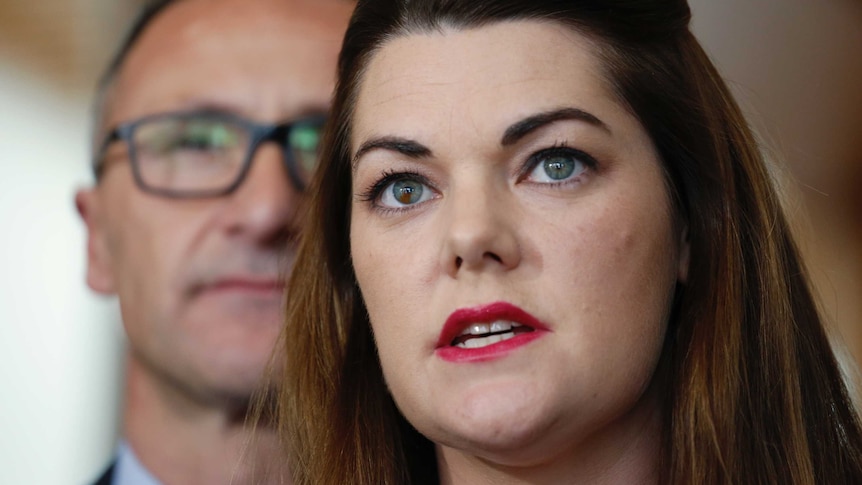 Greens Senator Sarah Hanson-Young talks to the media with leader Richard Di Natale