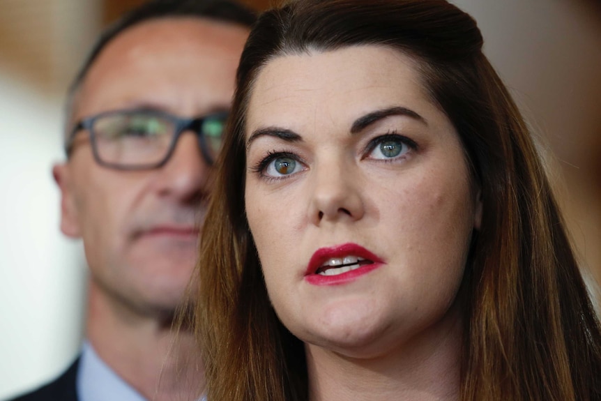 Greens Senator Sarah Hanson-Young talks to the media with leader Richard Di Natale