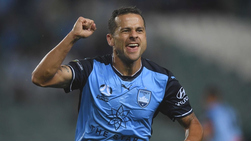 Bobo of Sydney celebrates scoring a goal.