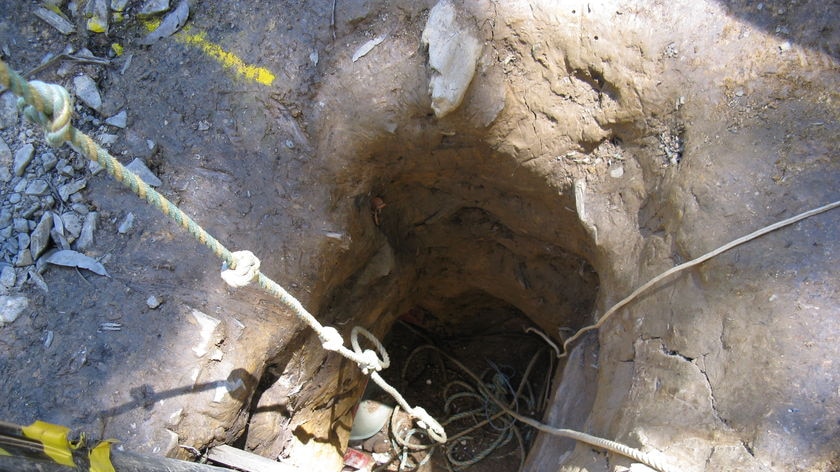 The 'spider hole' tunnel at the protest camp.