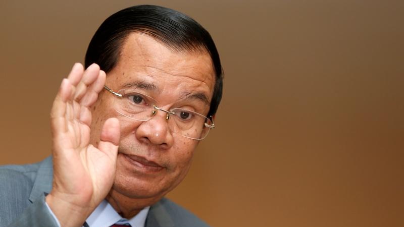 Hun Sen looks like he's waving