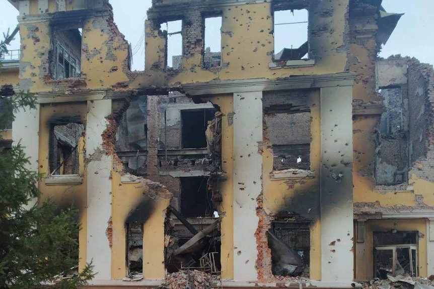 a multi-storey  building burned and destroyed by bombings or missile attacks
